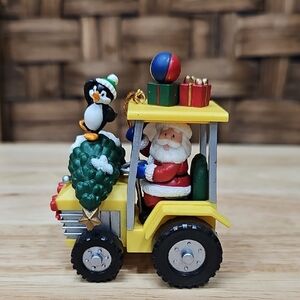 Santa's Christmas Festive Tractor Ornament with Penguin
